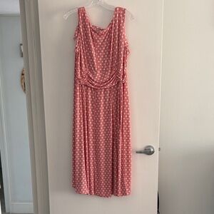 Classic peachy pink polkadot dress. This dress has never been worn.